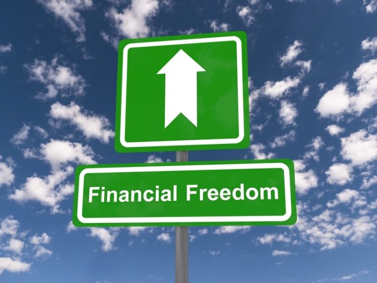 green sign that says financial freedom